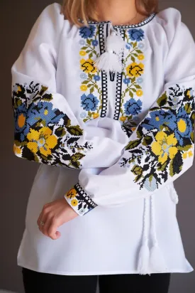 Women's embroidered blouse with blue and yellow embroidery